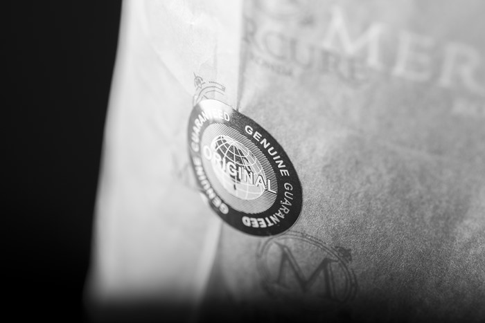 Sello anti falsificación Mercure